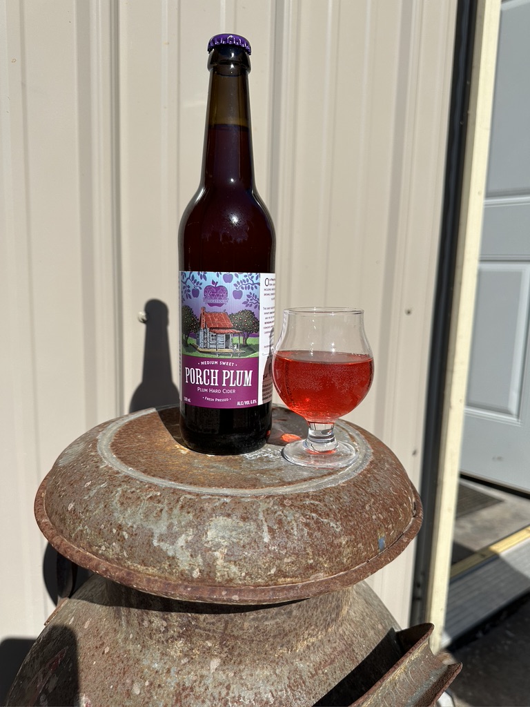 It has been a long time coming- we have been doing blending trials and looking for the best natural fruit for awhile, but we finally have released a truly unique and great tasting cider- our new Plum Cider.

We call it Porch Plum, thinking of sitting on the porch on a late summer day, drinking a cold refreshing beverage.

Our Porch Plum is made from a blend of apples including hewe’s crab, jonagold, browns, somerset redstreak and ellis bitter. This early season blend of apples imparts sharp, balanced acidity and the red plums provide a refreshing sweet flavor. It is fermented medium sweet and lightly carbonated.

This cider is just getting onto local store shelves, and a few breweries and pubs are starting to tap it, we hope you can try it soon!